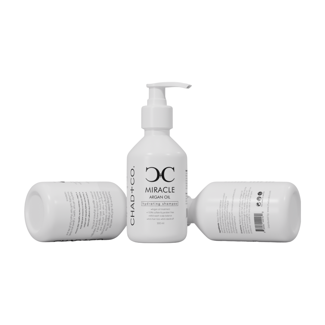 Three CHAD+CO Miracle Shampoo bottles
